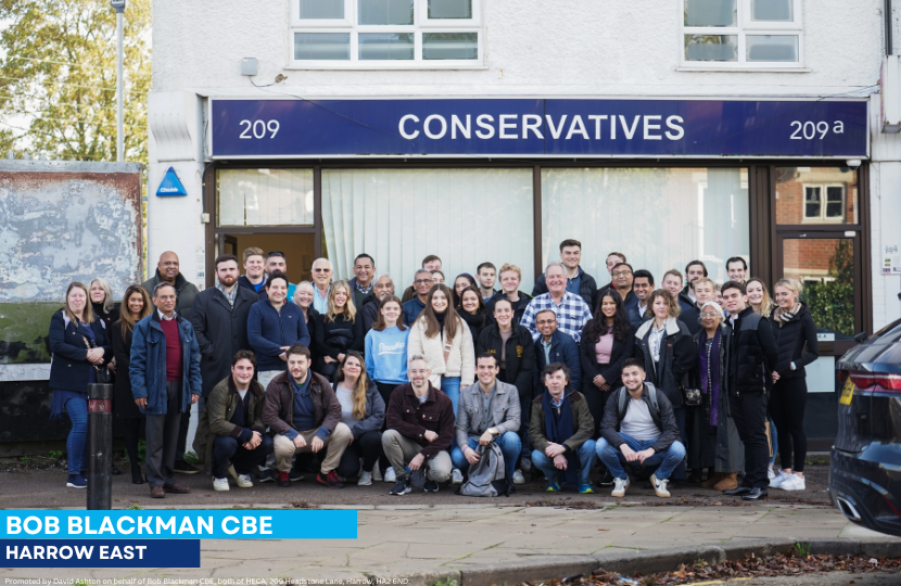 Crowd of supporters and volunteers with Bob Blackman.